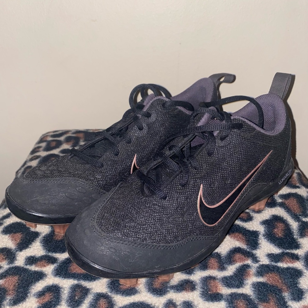 Nike black and rose gold cleats